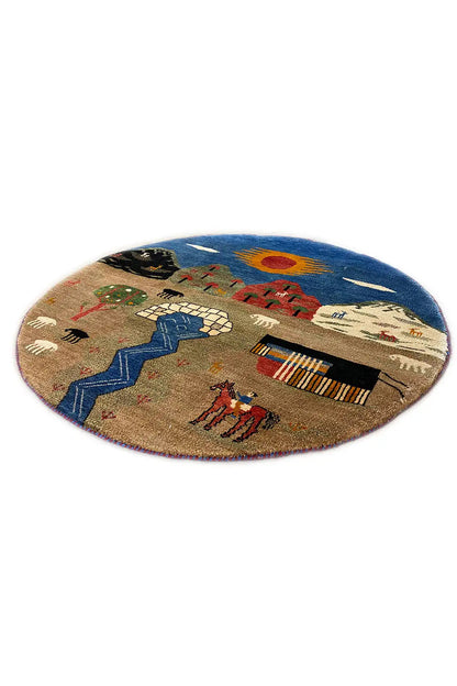 Round Gabbeh rug (103x103 cm) with a central figurative motif, blue and beige