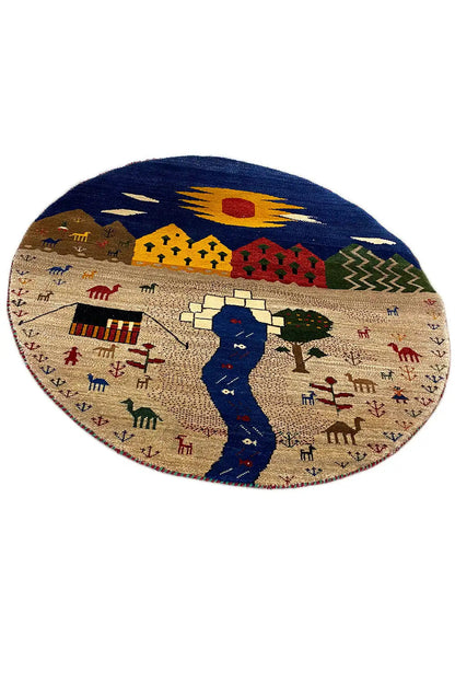 Round Gabbeh rug: beige with a blue horse and colorful village pattern