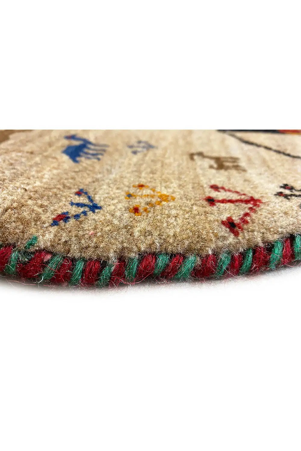Gabbeh rug edge with a colorful fringe border and detailed woven pattern