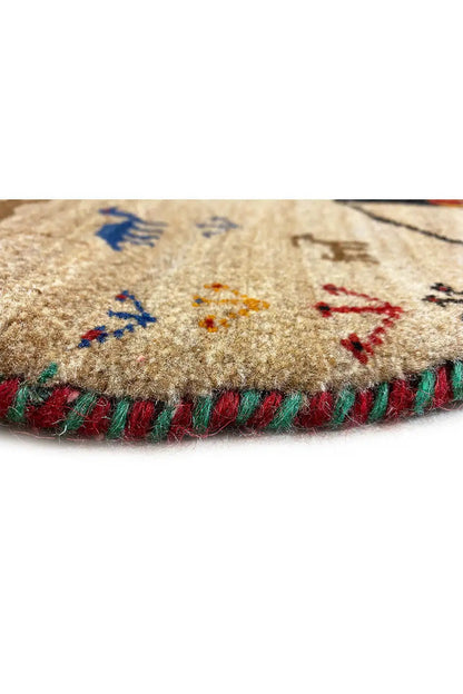 Gabbeh rug edge with a colorful fringe border and detailed woven pattern