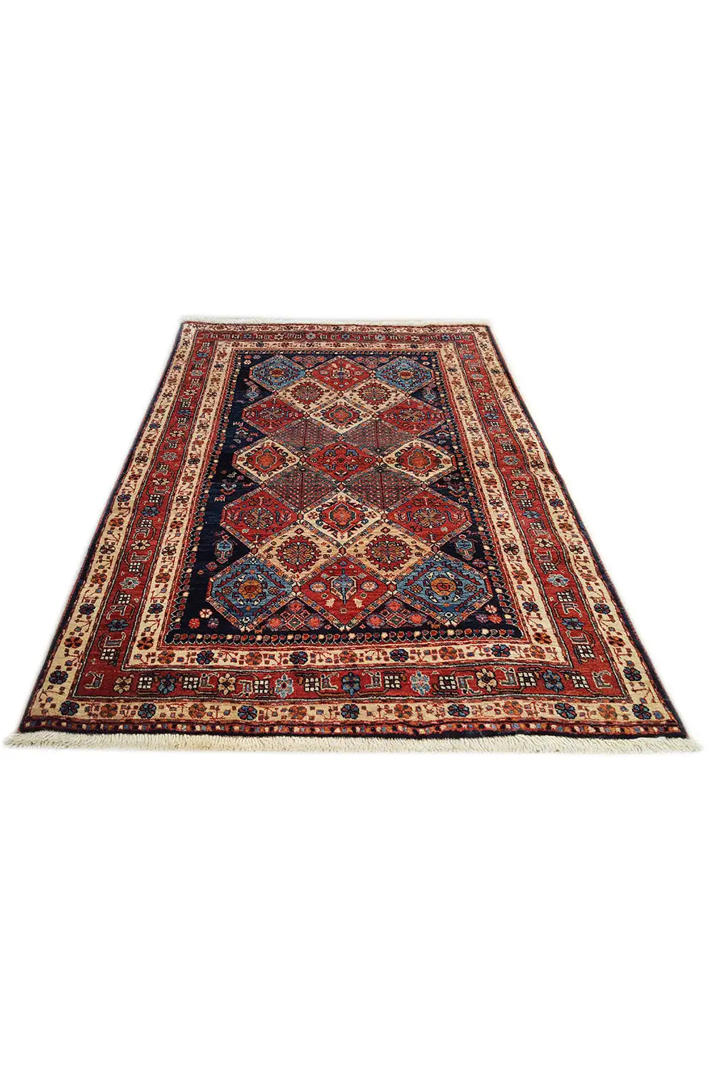 Rectangular rug with an ornate pattern in red, blue, and beige, with fringes