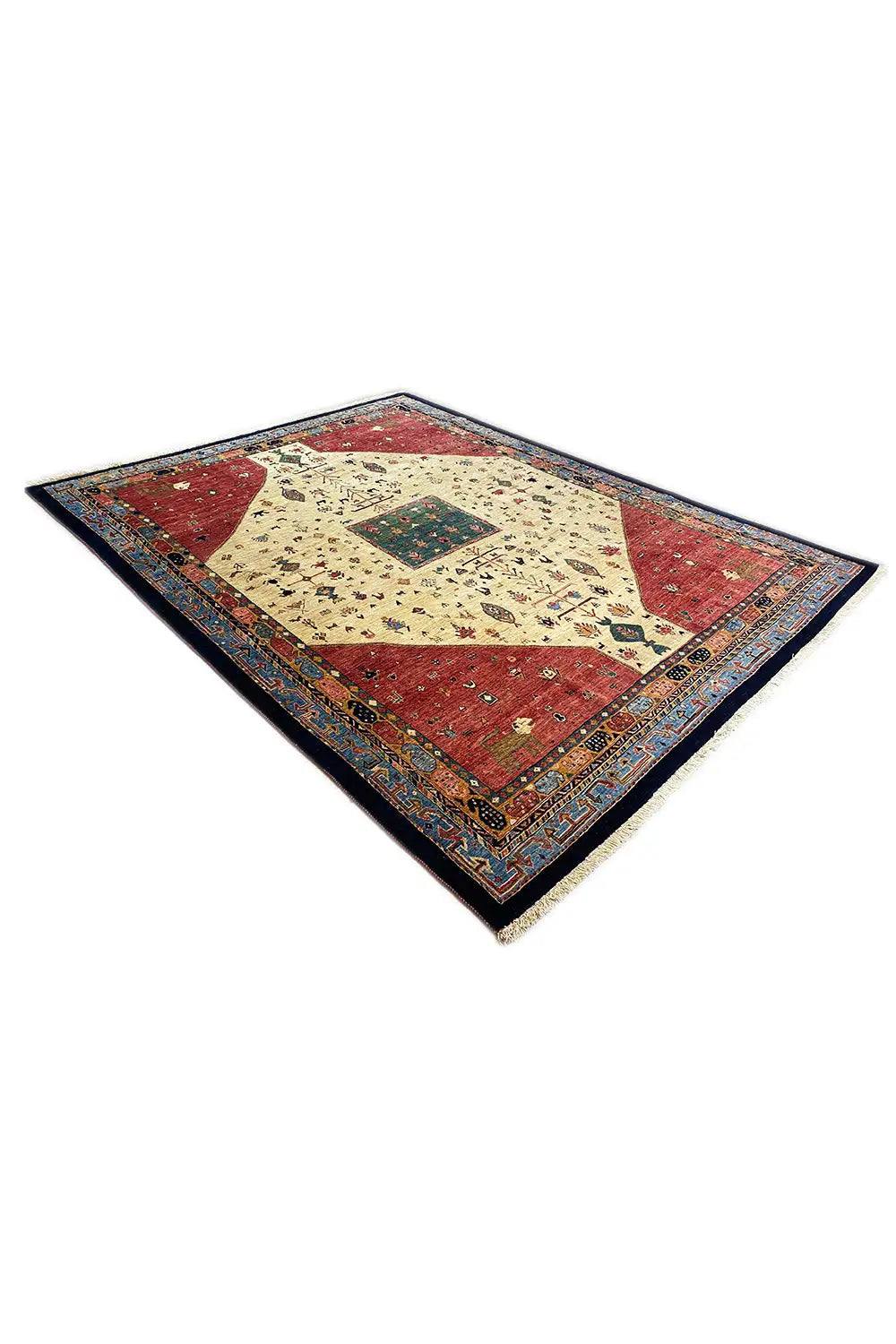 Rug in the corner: red field, beige ornamentation, and dark blue border band