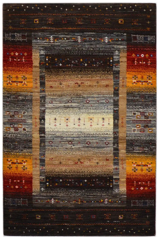 Gabbeh rug 130x83 cm with a brown background, red and yellow borders, and patterns