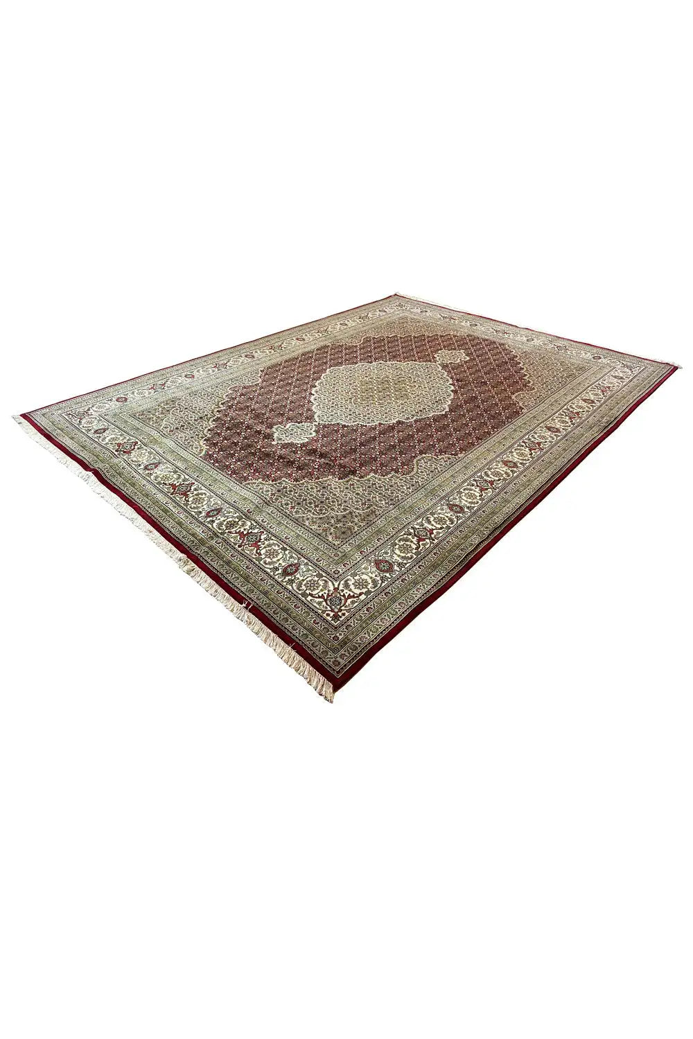 Indo Tabriz rug in a diamond pattern, with a medallion motif and border in cream, brown, and dark red
