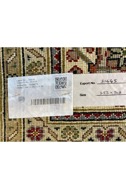 Indo Tabriz rug with sewn-in label and QR code, barcode, and export data