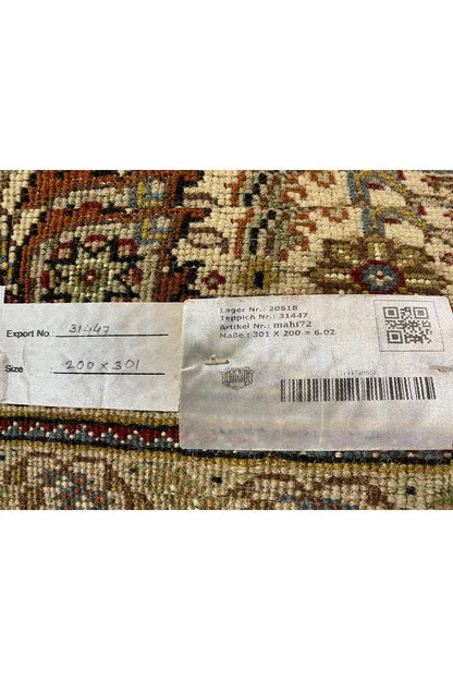 Rug with attached label, side stripes, and patterned background