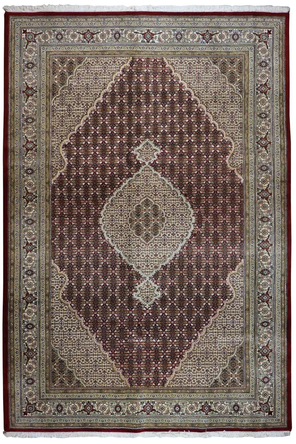 Rug with a reddish-brown background, medallion, and ornamental border in beige and blue