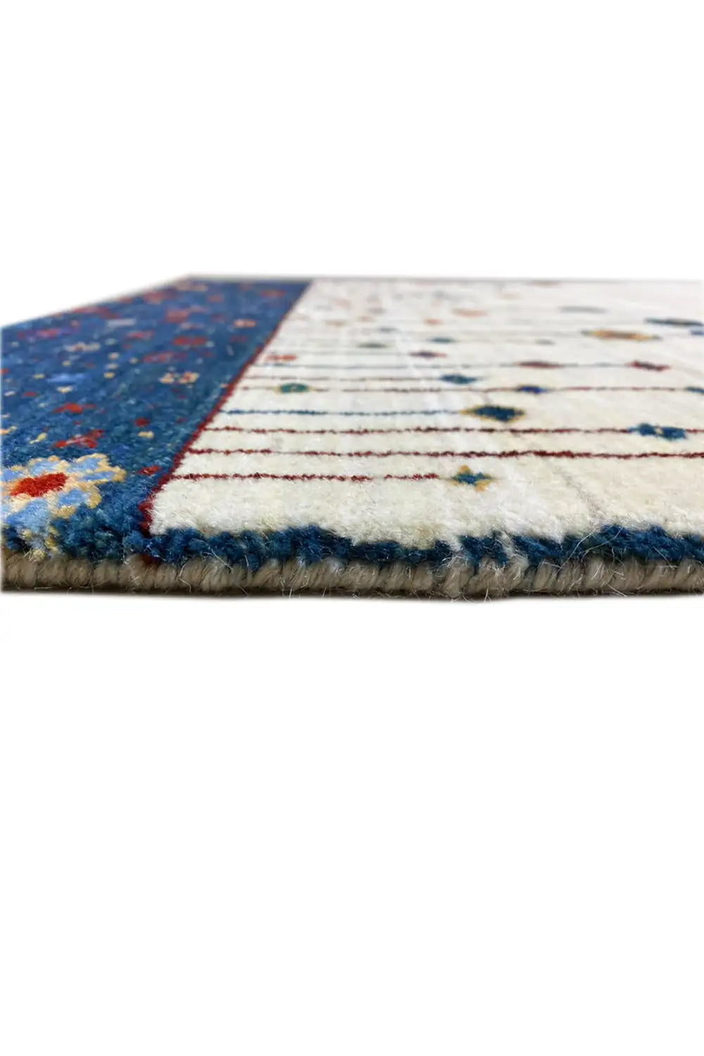 Gabbeh rug 123x77 cm Detail of the edges: short fringes and colorful border at the top