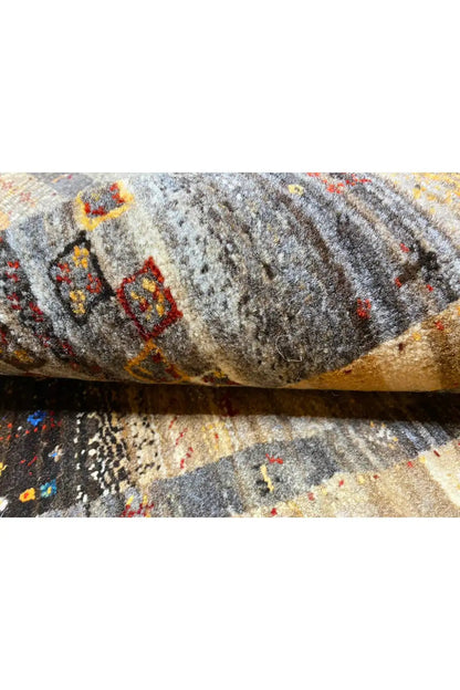 Gabbeh rug 123x79 cm, pile detail with a gray background and small red ornaments