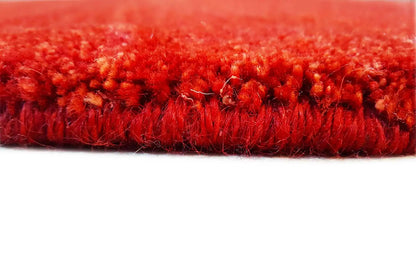 Round Gabbeh rug (93x93 cm) in red, side edge finished with fringes