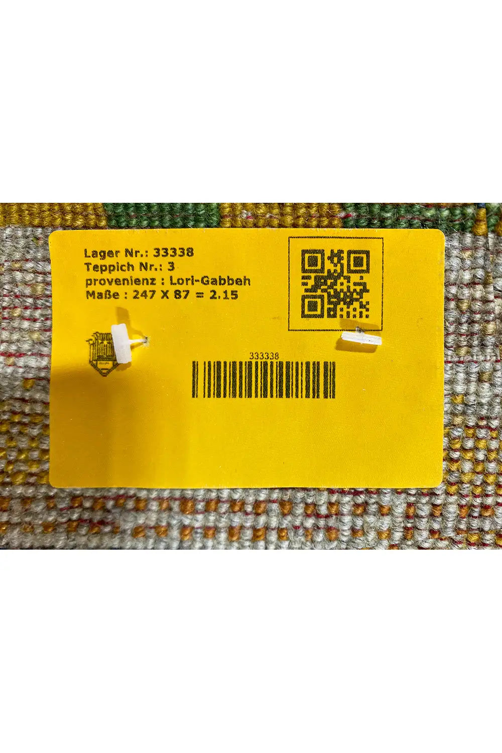 Back label on the carpet with QR code, dimensions 247×87 cm