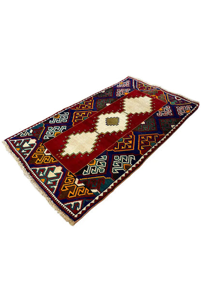 Gabbeh rug, diagonal: red band motif, cream medallions, blue ornaments