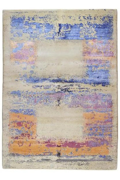 Designer square rug with abstract color blocks in blue, purple, and orange