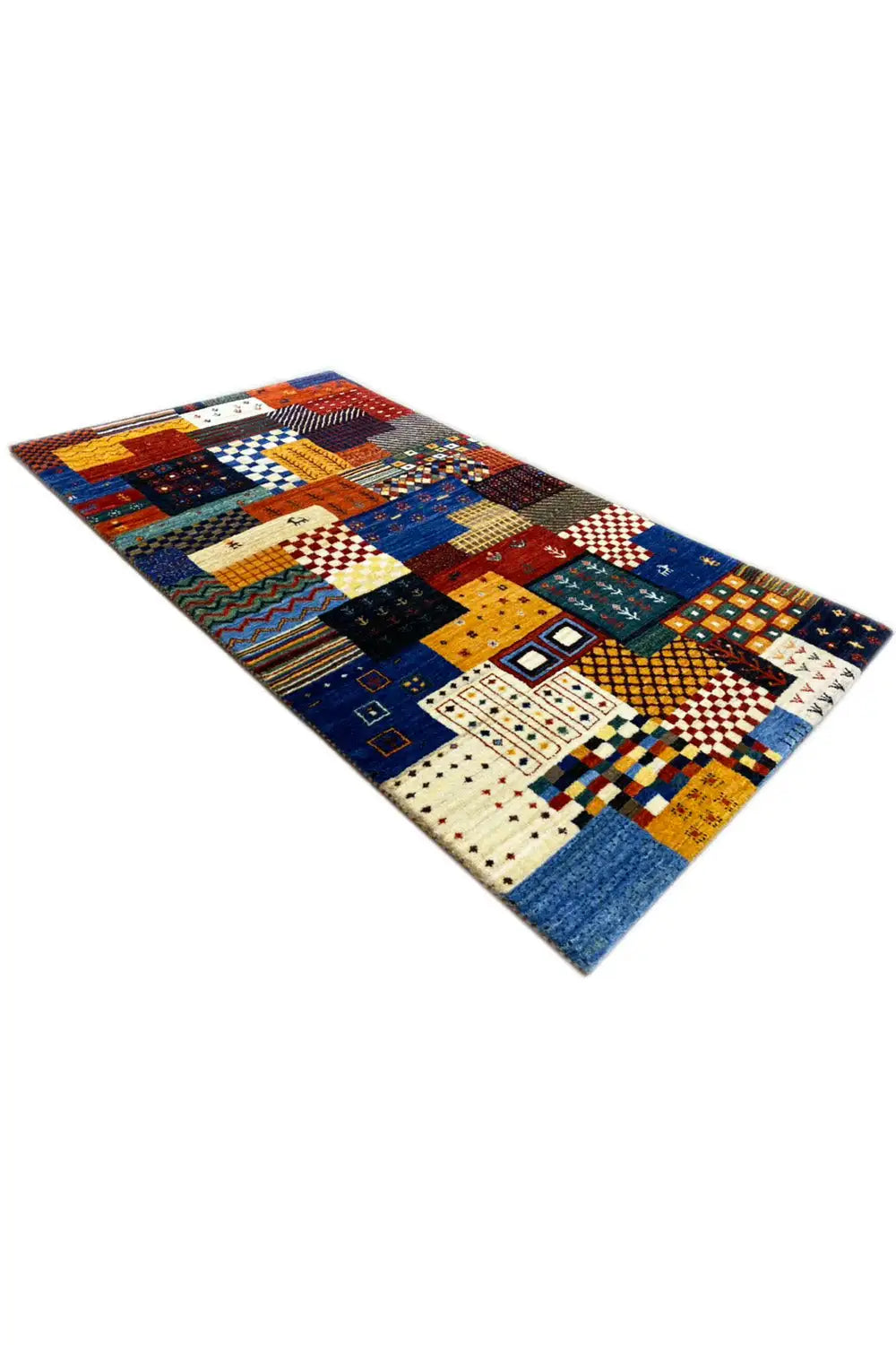 Gabbeh rug at an oblique angle, diverse geometric tile patterns in blue and red