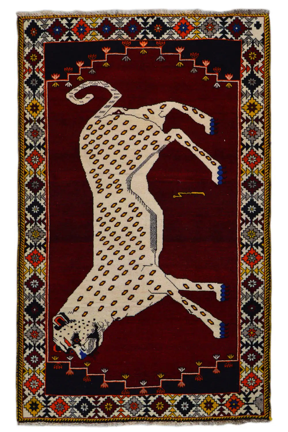 Gabbeh rug with a beige animal motif and deep red background, framed by a colorful border
