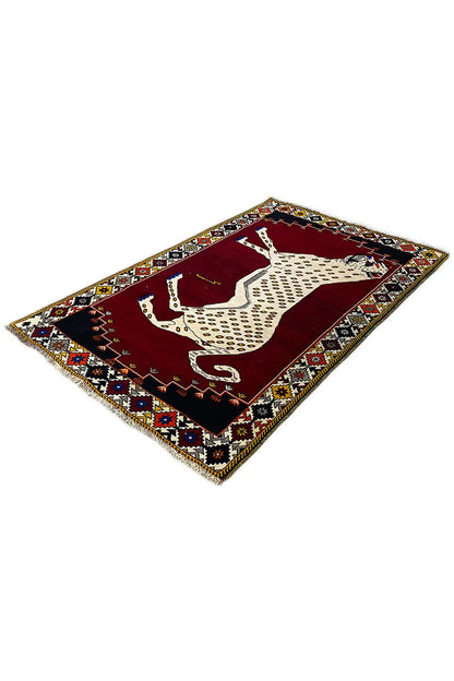Gabbeh rug, square rotated: animal motif in beige on dark red with a colorful border
