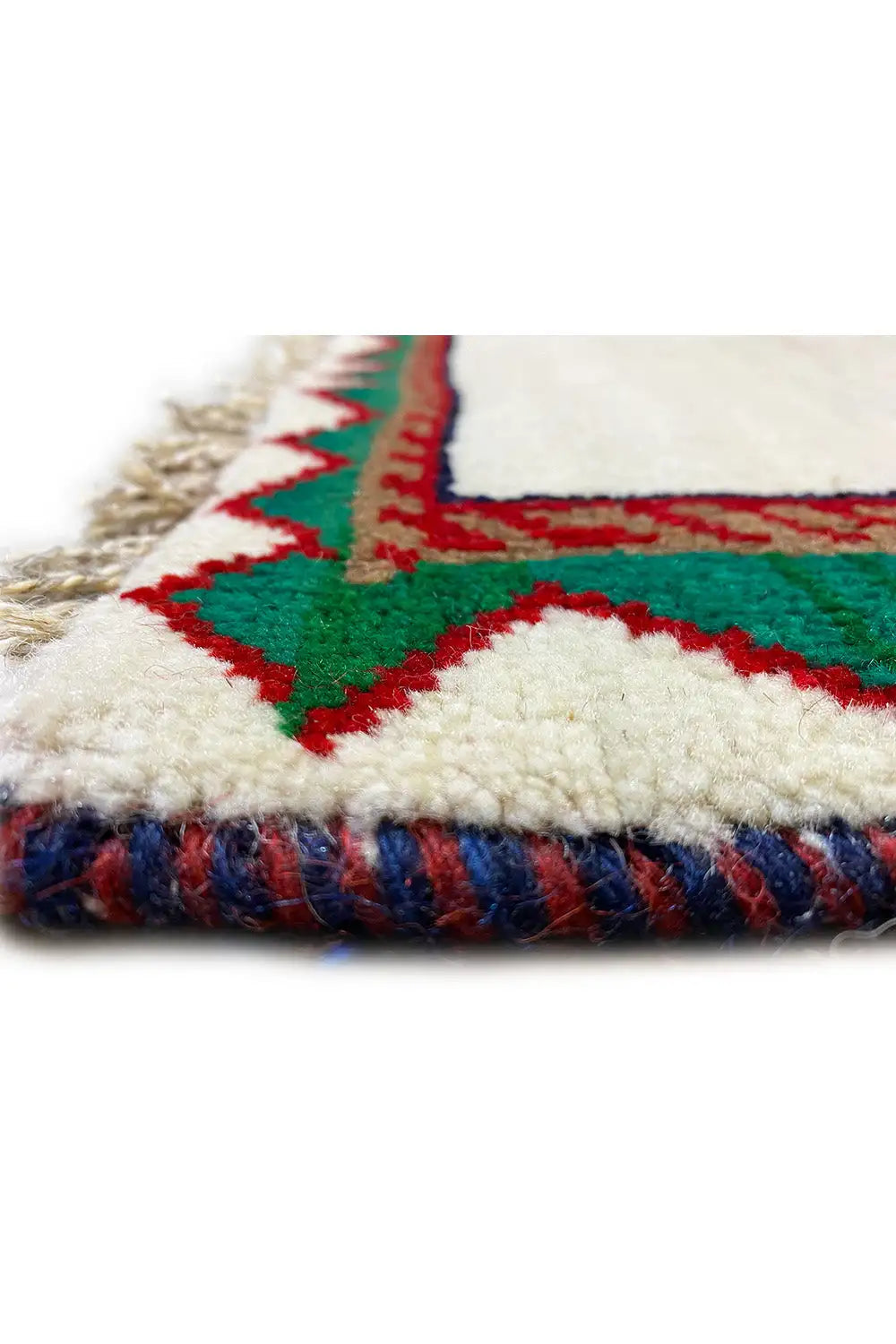 Gabbeh rug with a zigzag border (green/red) and colorful fringed edge