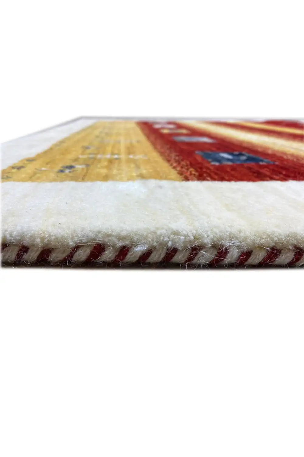 Gabbeh rug 149x99 cm: close-up of the edge with dense red and yellow fringes