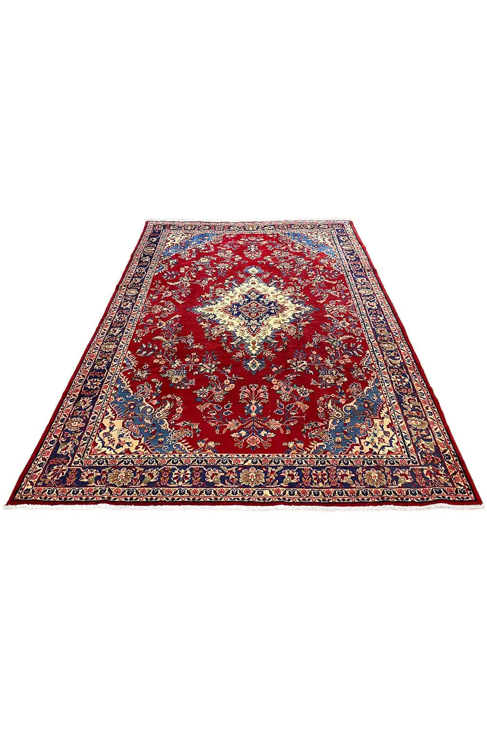 Draped Oriental rug in red with a central medallion and blue border