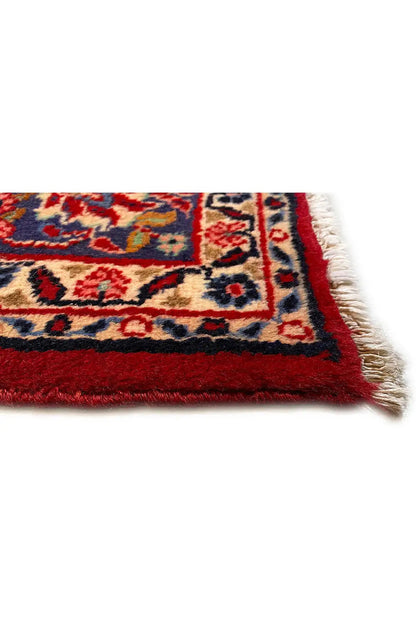 Carpet edge with fringe: red field and blue ornament pattern