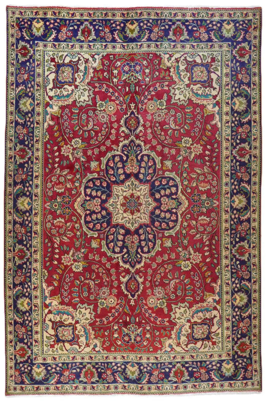Tabriz rug: red medallion, ornamental border in blue and gold