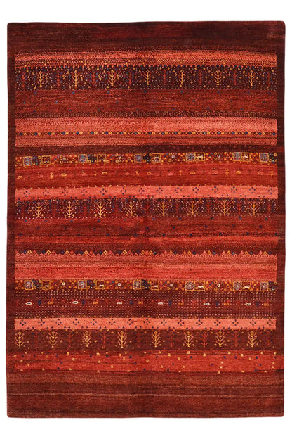 Rectangular Gabbeh rug: horizontal striped pattern in reddish brown with colorful details.