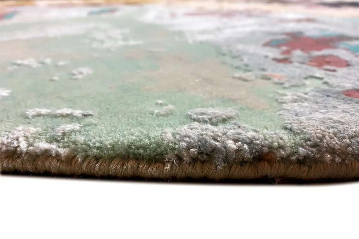 Short-pile rug edge with a multicolored abstract pattern