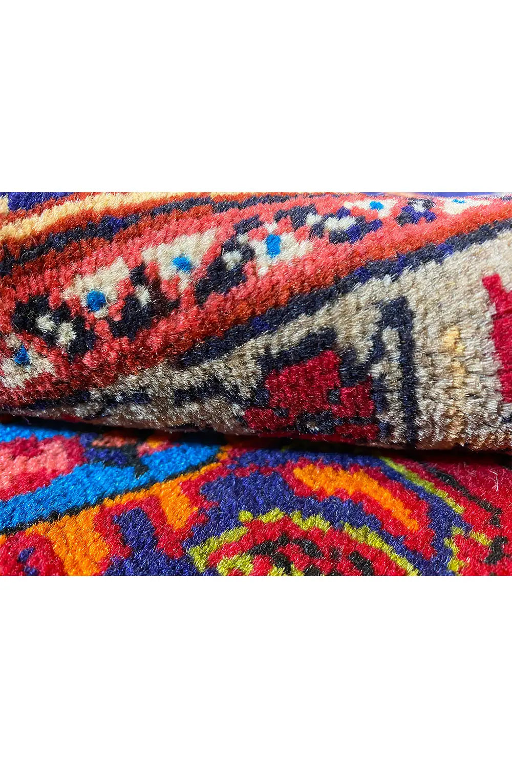 Carpet detail with multicolored patterns and dense pile