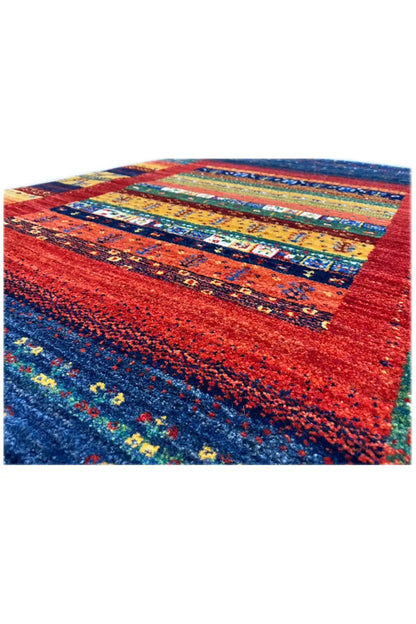 Gabbeh rug 122x79 cm, close-up of a central band in red, blue and green