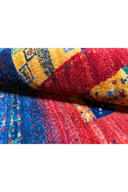 Gabbeh rug 122x79 cm detail view: pile with colorful ornamental segments