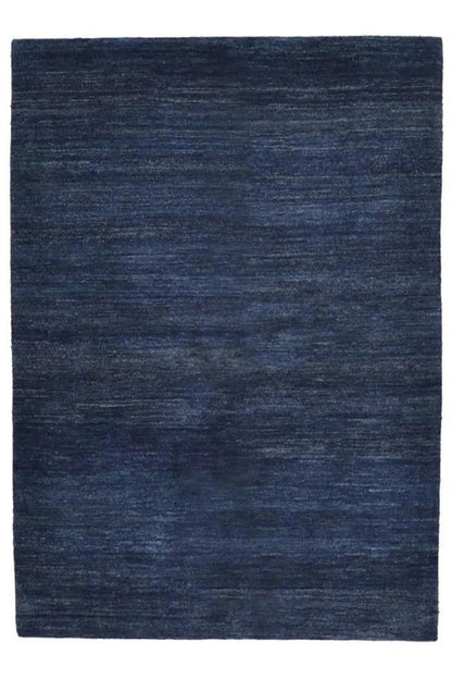 Blue gabbeh rug, square view, evenly mottled surface