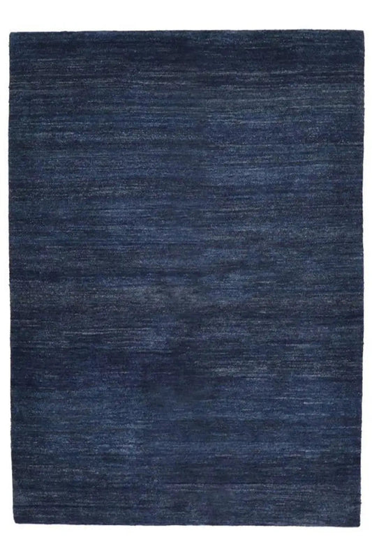 Blue gabbeh rug, square view, evenly mottled surface