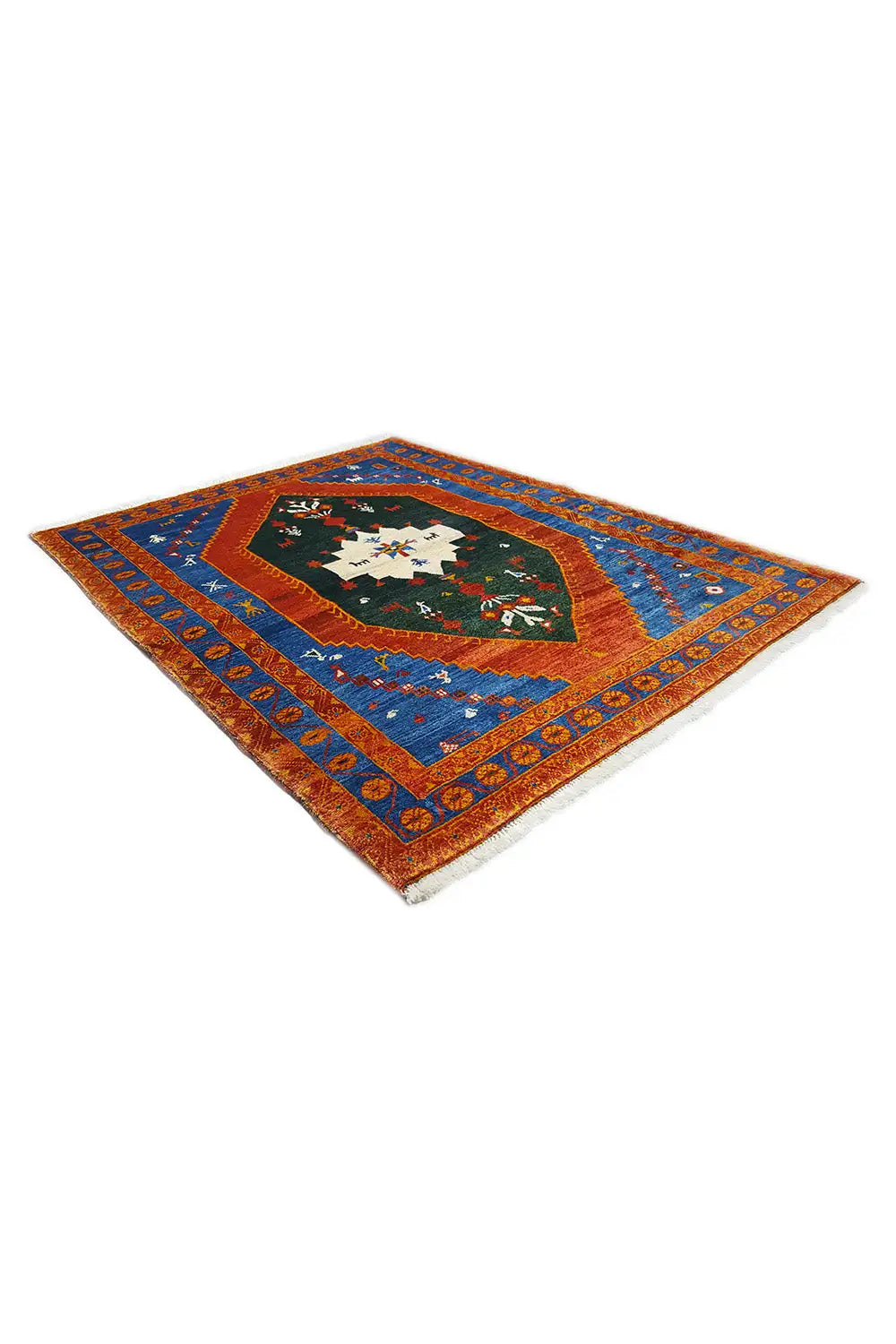 Gabbeh rug laid out: blue field, orange border, central medallion in green