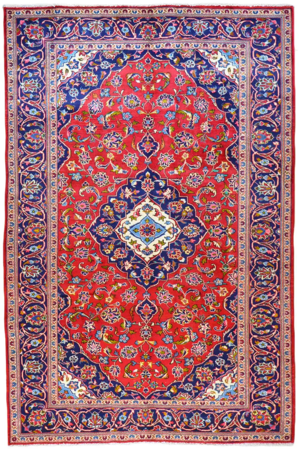 Keshan rug with a red medallion, blue border, and multicolored ornaments, rectangular