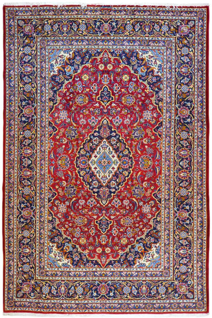 Oriental rug with a red background, blue-and-gold ornaments, and a central medallion