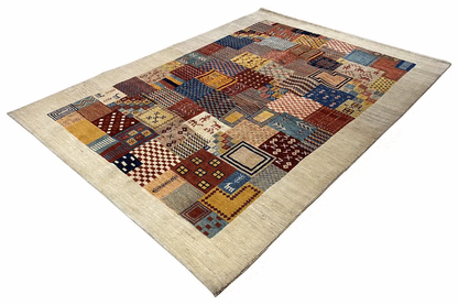 “Lori” gabbeh rug with patchwork design in blue, brown, and beige, rectangular