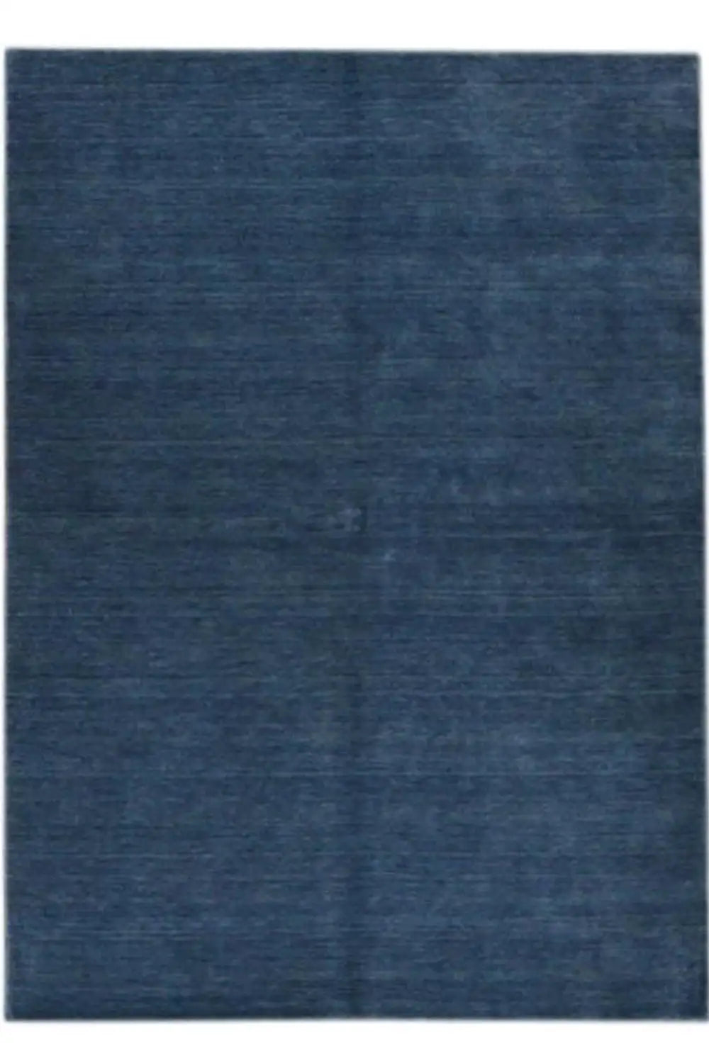 Dark blue carpet, straight-on view, subtle mottled weave pattern