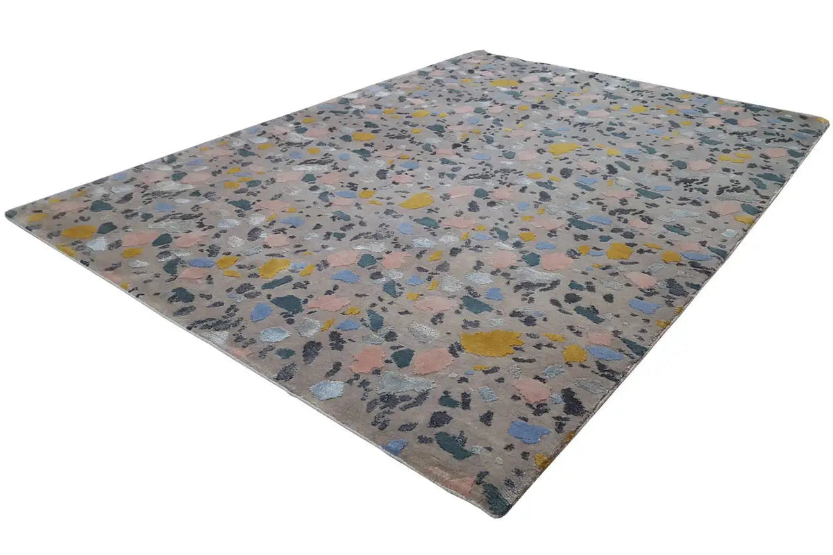 Terrazzo designer rug by Pascal Walter, patterned with colorful stone chips