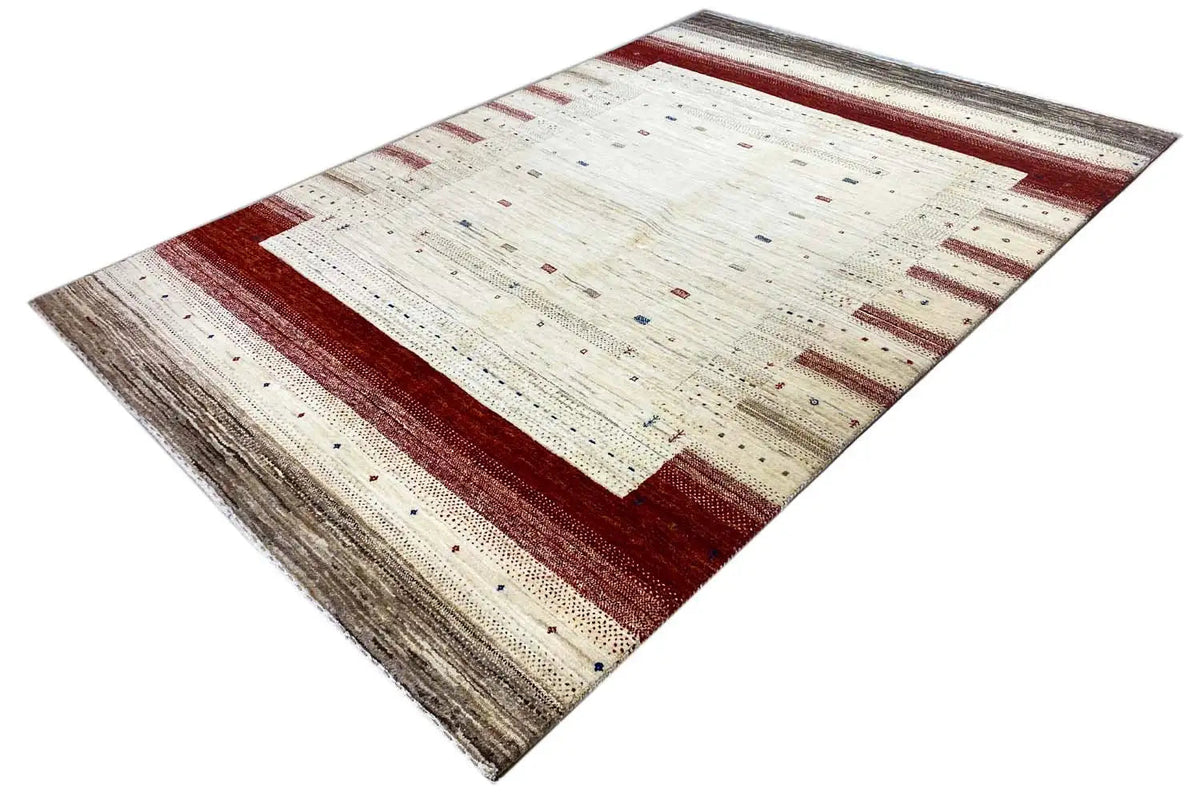 Gabbeh rug with a cream-colored background, reddish-brown border, and small pattern details
