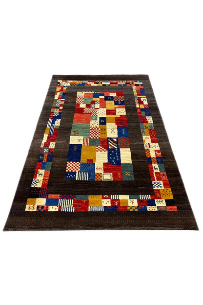 Gabbeh rug 169x107 cm, flat patchwork pattern with red, blue, and beige sections