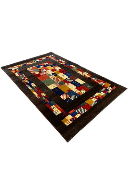 Gabbeh rug 169x107 cm with a patchwork pattern of colorful squares and a dark border