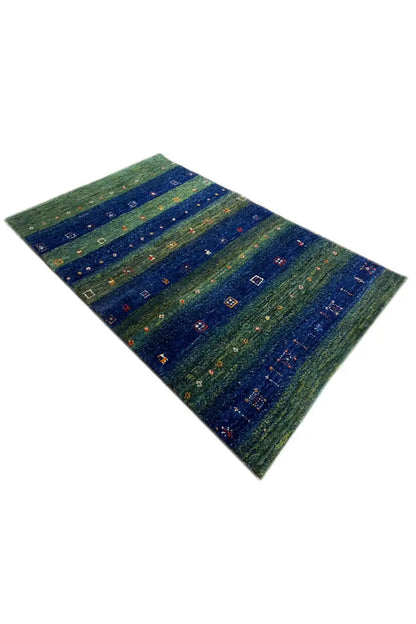 Gabbeh rug 128x81 cm, spread diagonally, blue-green with colorful patterned sections