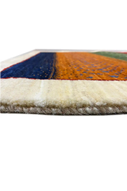 Gabbeh rug 127x80 cm, close-up of the edge with a soft pile and dense weave structure
