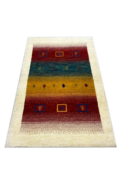 Gabbeh rug 121x83 cm, cream-colored border, striped pattern in red, blue, and yellow