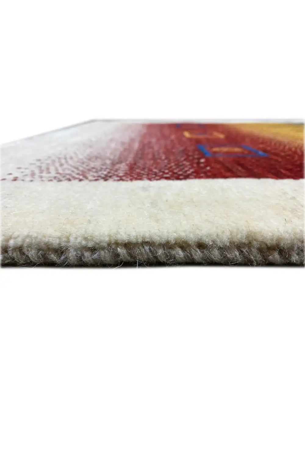 Gabbeh rug 121x83 cm close-up of the woven edge with a light border and short fringes