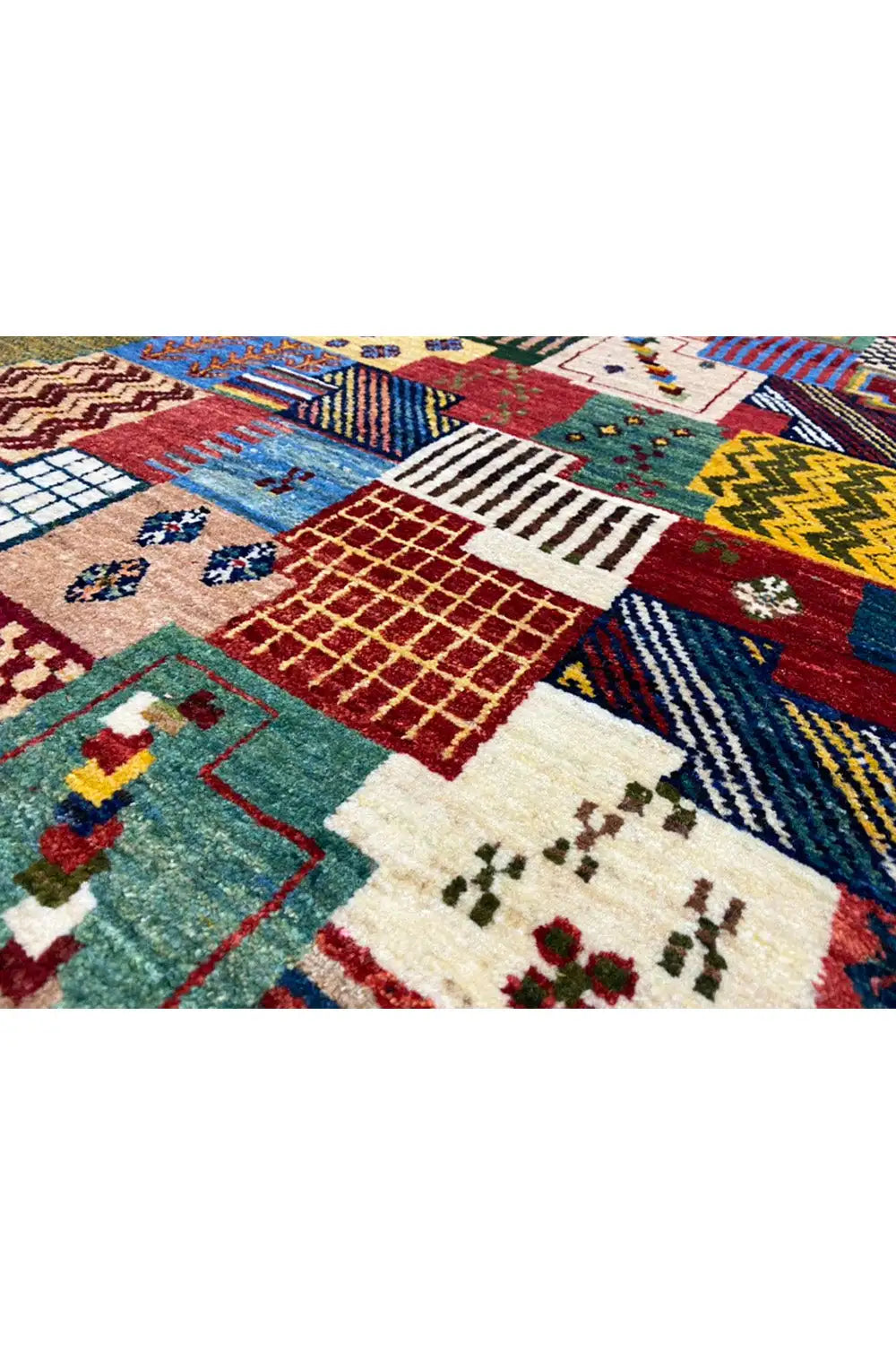 Gabbeh rug 129x80 cm detail view with colorful geometric patchwork blocks
