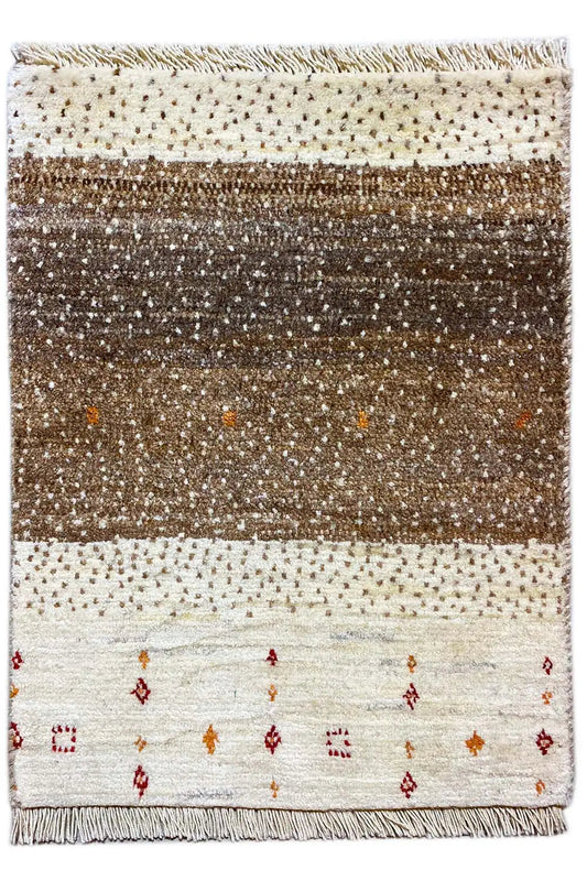 Gabbeh rug with wide brown stripes, colorful dots, a cream-colored border, and fringe