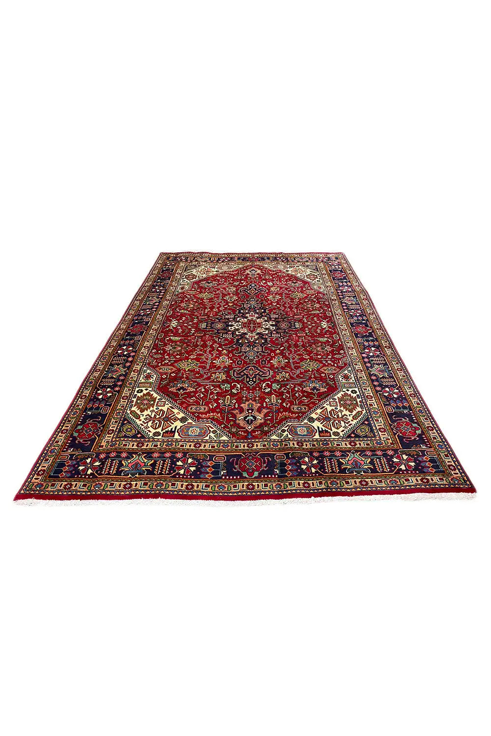 Rectangular Oriental rug with a red background, blue border, and ornamental medallions