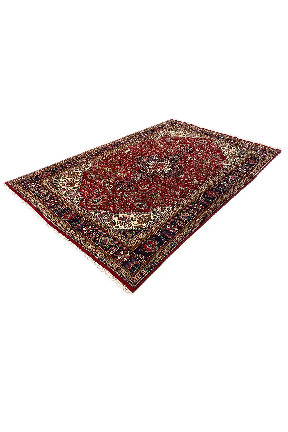 Rectangular Oriental rug in angled view, red pattern with a dark border