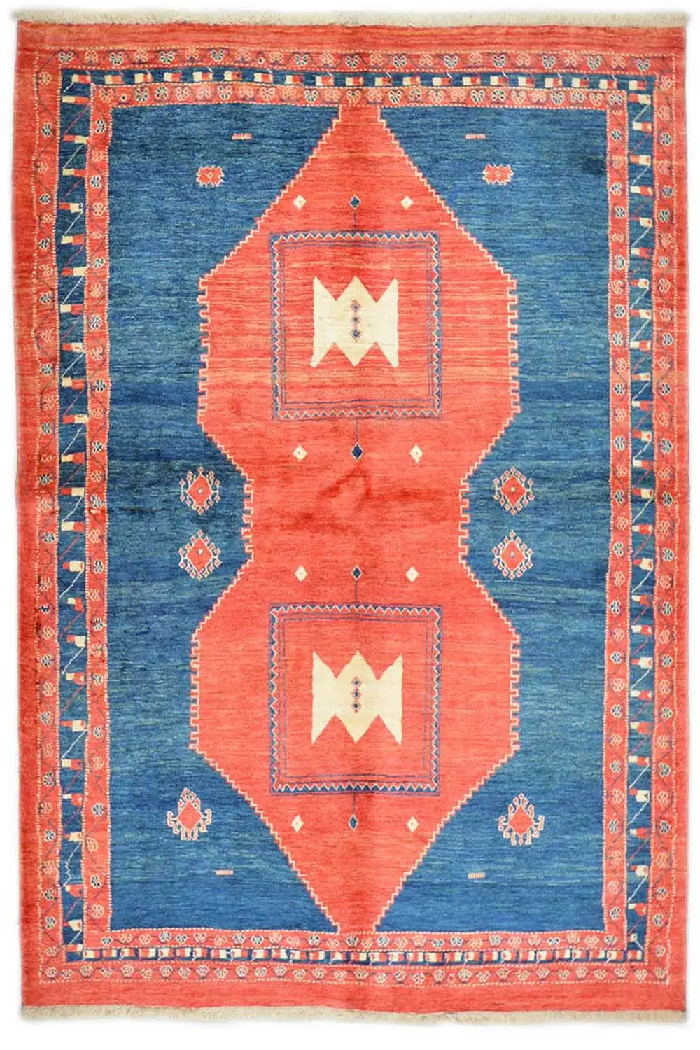 Carpet with a blue ground, orange-red border, and geometric medallion pattern